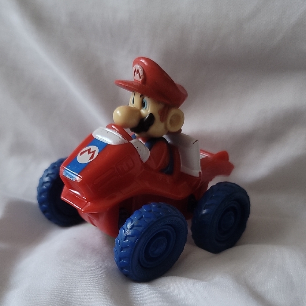 Red and Blue Toy Car with Character